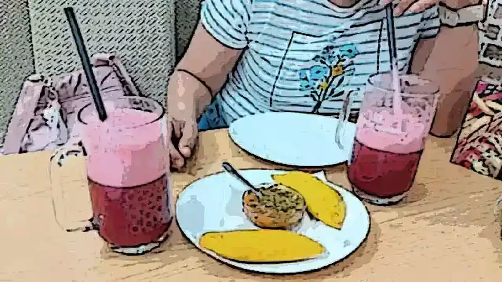A Spanish-Colombian couple sharing Colombian food at Pizza Burguer, a restaurant located in the Carmen neighborhood of Murcia, next to Floridablanca Park.